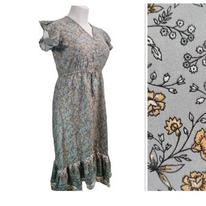 Beautiful boho floral dress with tassles